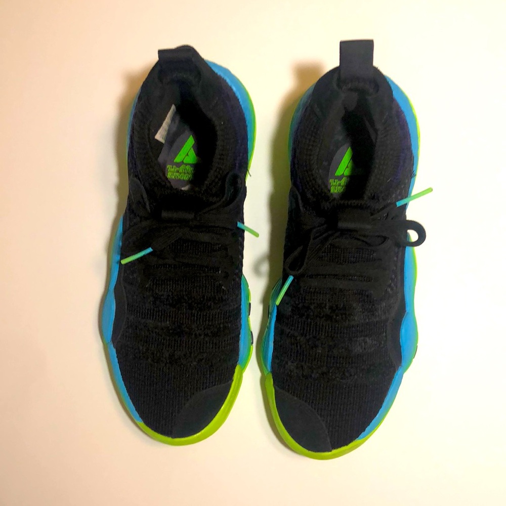 Adidas Trae Young basketball shoes. Size (6 1/2). Colors- black, blue and green.